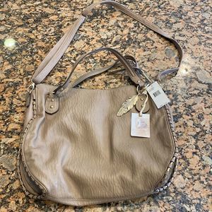 NWT Jessica Simpson Selena bag. Natural color. New bag with a small Blem.